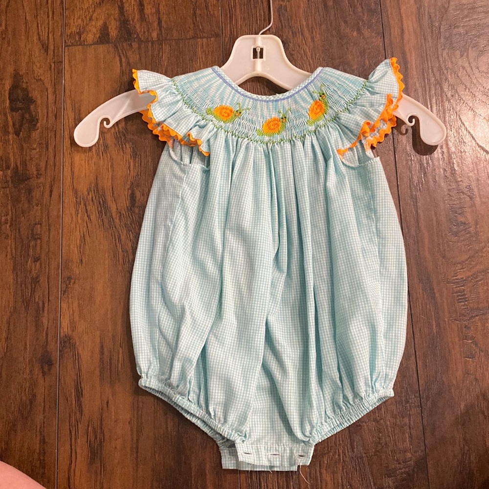 Turquoise smocked snail bubble romper